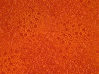 Tela naranja con flores más oscuras