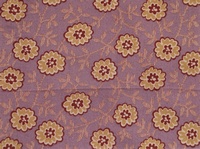 Tela de flores de color ocre sobre fondo morado