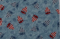 Tela con dibujo de barcos azules y rojos sobre fondo azul